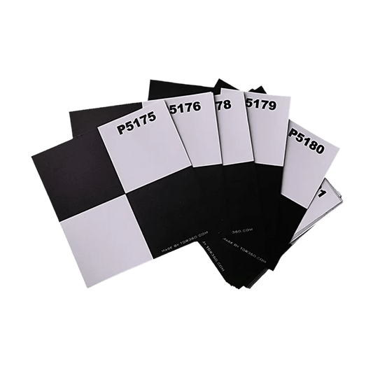 Set of self-adhesive square targets in black and white checkerboard pattern for surveying, topography and 3D laser scanning.